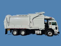 2019 Peterbilt 520 with Heil Half/Pack 40yd Front Loader Refuse Truck